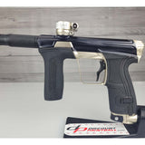 Left side body USED Planet Eclipse CS2 Paintball Marker Black Sandstone on a white surface and wooden background