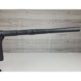 Right side barrel USED Planet Eclipse CS2 Paintball Marker Black Sandstone on a white surface and wooden background