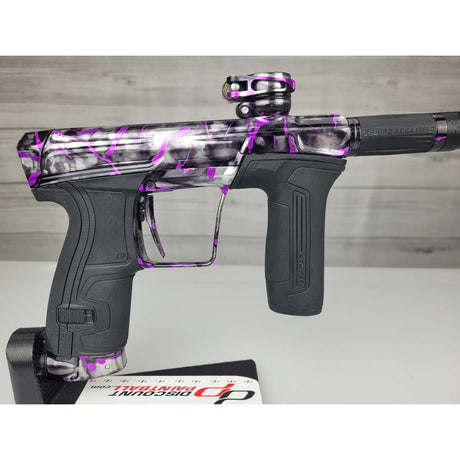Right side body USED Planet Eclipse CS2 Paintball Marker Black Purple Grey Splash on a woodgrain background