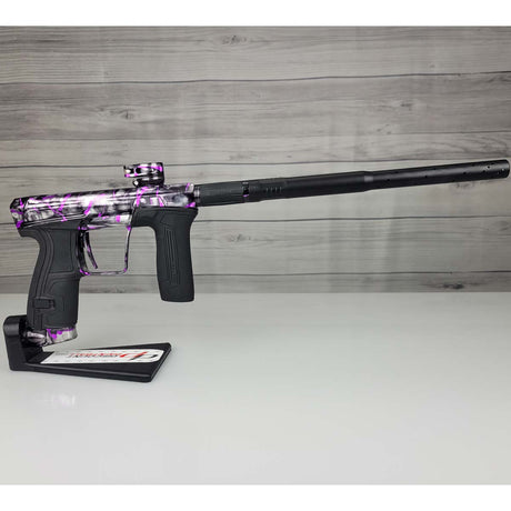 Right side USED Planet Eclipse CS2 Paintball Marker Black Purple Grey Splash on a woodgrain background