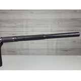 Right side barrel USED Planet Eclipse CS2 Paintball Marker Black Purple Grey Splash on a woodgrain background