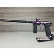 Left side USED Planet Eclipse CS2 Paintball Marker Black Purple Grey Splash on a woodgrain background