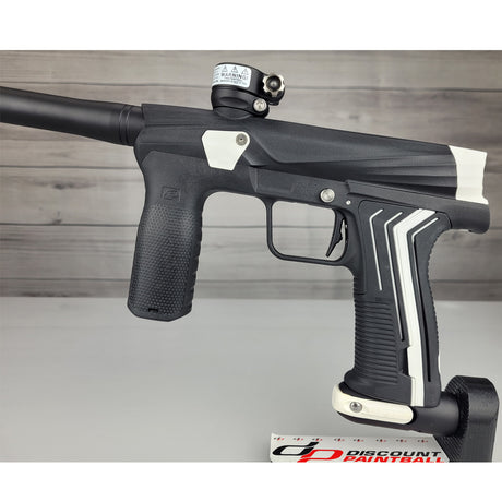 USED Planet Eclipse Etha 3M paintball gun with white accents on a wooden background, featuring Discount Paintball branding.