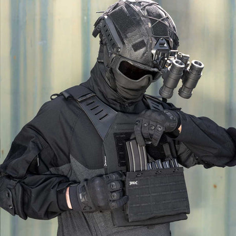 Front angle of black BSX Plate Carrier LC  for airsoft and paintball with mags on a person dressed in tactical gear