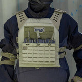 Front of olive green BSX Plate Carrier LC  for airsoft and paintball with mags on a person dressed in tactical gear and black gloves