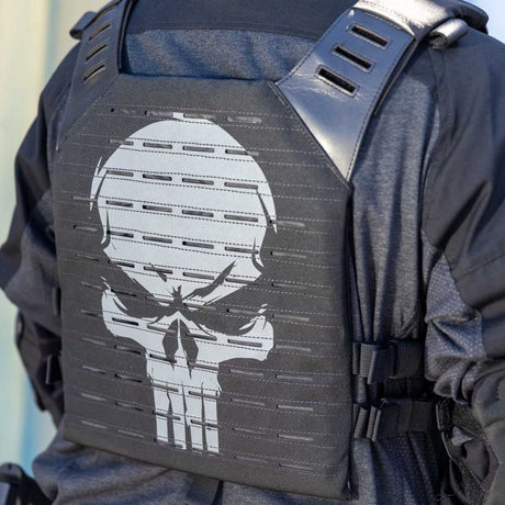Person wearing a black HK Army BSX Skull Plate Carrier for molle attachments for airsoft and paintball, shown from the back