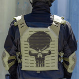 Back of olive green HK Army BSX Skull Plate Carrier for molle attachments for airsoft and paintball, shown on a person in tactical attire