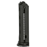 Black spring loaded First Strike XP paintball pistol 6 Round Magazine for round paintballs and FSR shaped rounds, on a white background.