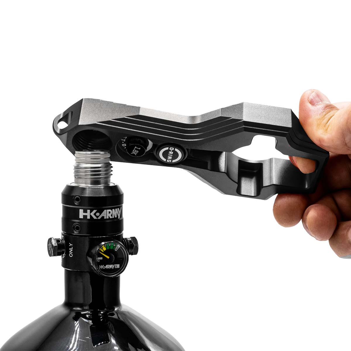 Black HK Army Regulator Multi Tool paintball and airsoft tank regulator remove with a regulator on a white background