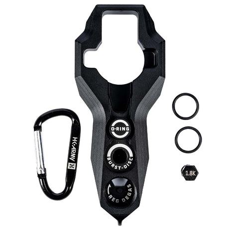 Black HK Army Regulator Multi Tool paintball and airsoft tank regulator remove with included parts on a white background