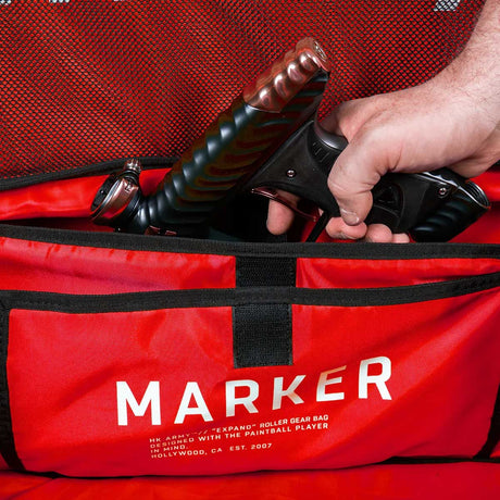 Marker compartment with marker of Black and red Paintball Expand 75L Roller Gearbag Shroud Black Red