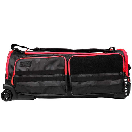 Side view of Black and red HK Army Paintball Expand 75L Roller Gearbag Shroud Black Red on a white background