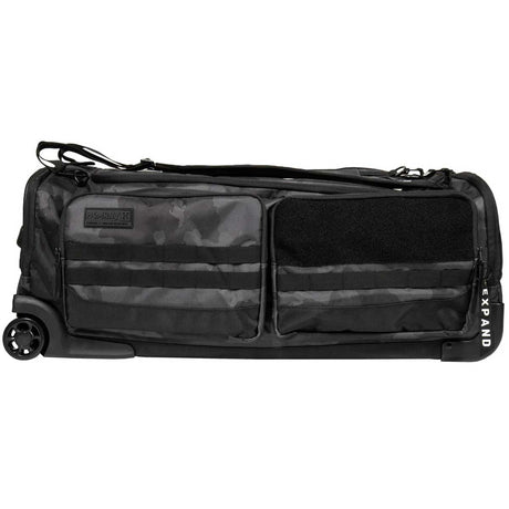 Side of Back of a black and grey camo HK Army Expand 75L Roller Gear Bag Shroud Blackout against a white background
