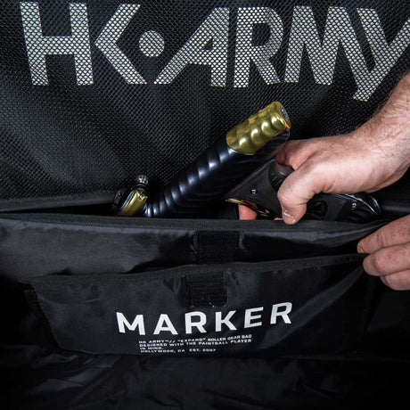 Open marker compartment Black green and grey camo print HK Army Paintball Expand 75L Roller Gear bag Shroud Forest on a white background