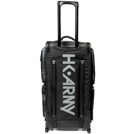 Back of Black green and grey camo print with white logo HK Army Paintball Expand 75L Roller Gear bag Shroud Forest with handle and wheels on a white background