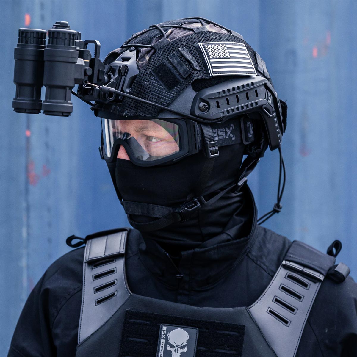 Black BSX Tango Airsoft Thermal Goggle for Airsoft on a person dressed in all black with a tactical helmet