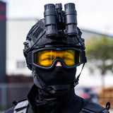 BSX Tango Airsoft Thermal Goggle with Multiple Lens shown with yellow lens installed on a person dressed in black tactical attire.