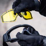 BSX Tango Airsoft Thermal Goggle with Multiple Lens shown uninstalling a yellow lens.