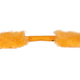 Close up of the middle of Orange plush faux fur HK Army Blade 2.0 Barrel Swab Orange for paintball on a plain white background.