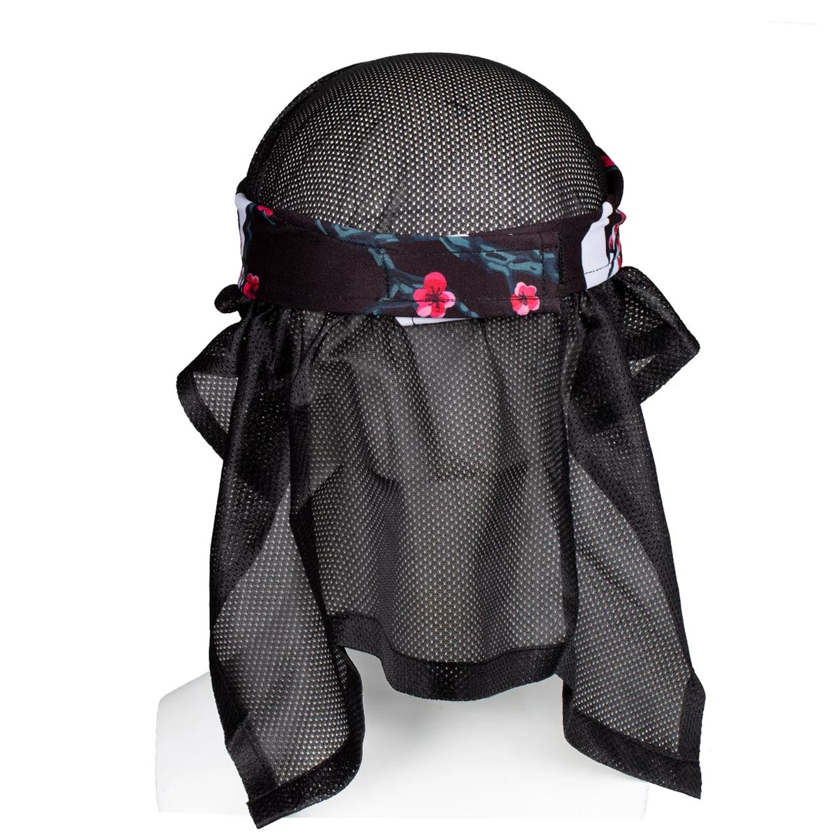 Back mesh HK Army Headwrap Blossom Black pink flowers on patterned headscarf on a mannequin head against a white background
