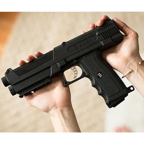 Salt .68 Caliber Self Defense launcher in a persons hands