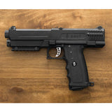 Salt .68 Caliber Self Defense launcher on a wood background
