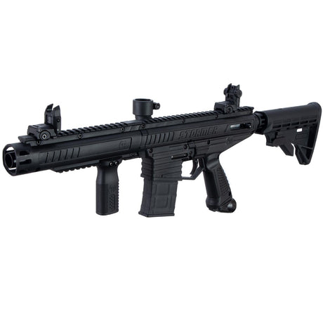Left front angle Tippmann Stormer Elite Dual Feed Paintball Marker Black on a white background