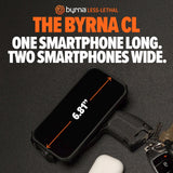 Byrna CL device with smartphone for scale on a dark background