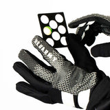 plastic HK Army Reload Paintball Hauler sizer being held by gloved hands on a white background.