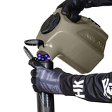 light smoke plastic HK Army Reload Paintball Hauler Caddy loading paintballs into a pod.

